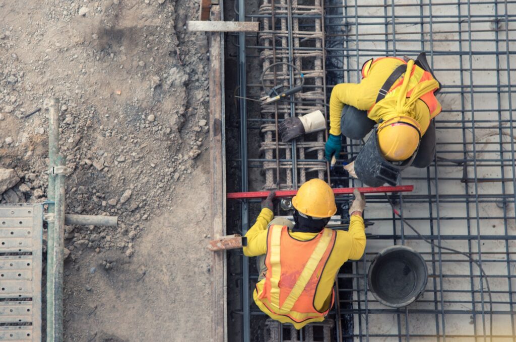 An aerial view of construction workers.